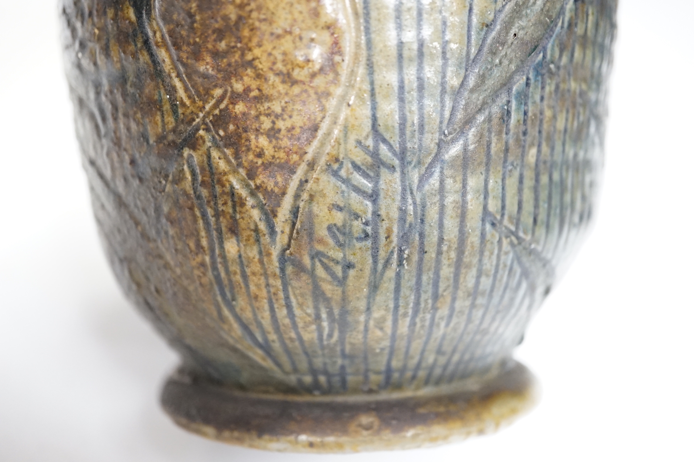 A R W Martin Brothers, London and Southall stoneware jug, repaired, mark to base, 22cm high